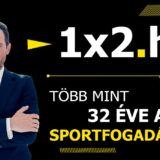 Elegáns férfi üzleti öltönyben, mellette a 1x2.hu és a Több mint 32 éve a sportfogadásban szövegek. Kiemelt téma a sportfogadás, Tippmix tippek és ingyenes Tippmix tippek.