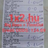 Kinyomtatott sportfogadási szelvény kézzel beírt végeredményekkel és sikeres tippeket jelző pipákkal.