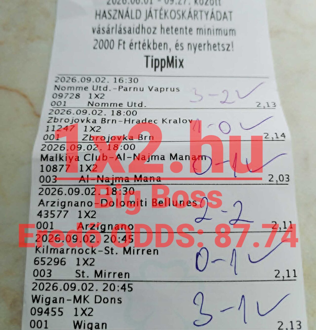 Nyertes TippMix papĂralapĂș fogadĂłszelvĂ©ny kĂ©zzel Ărt vĂ©geredmĂ©nyekkel Ă©s pipa jelölĂ©sekkel.